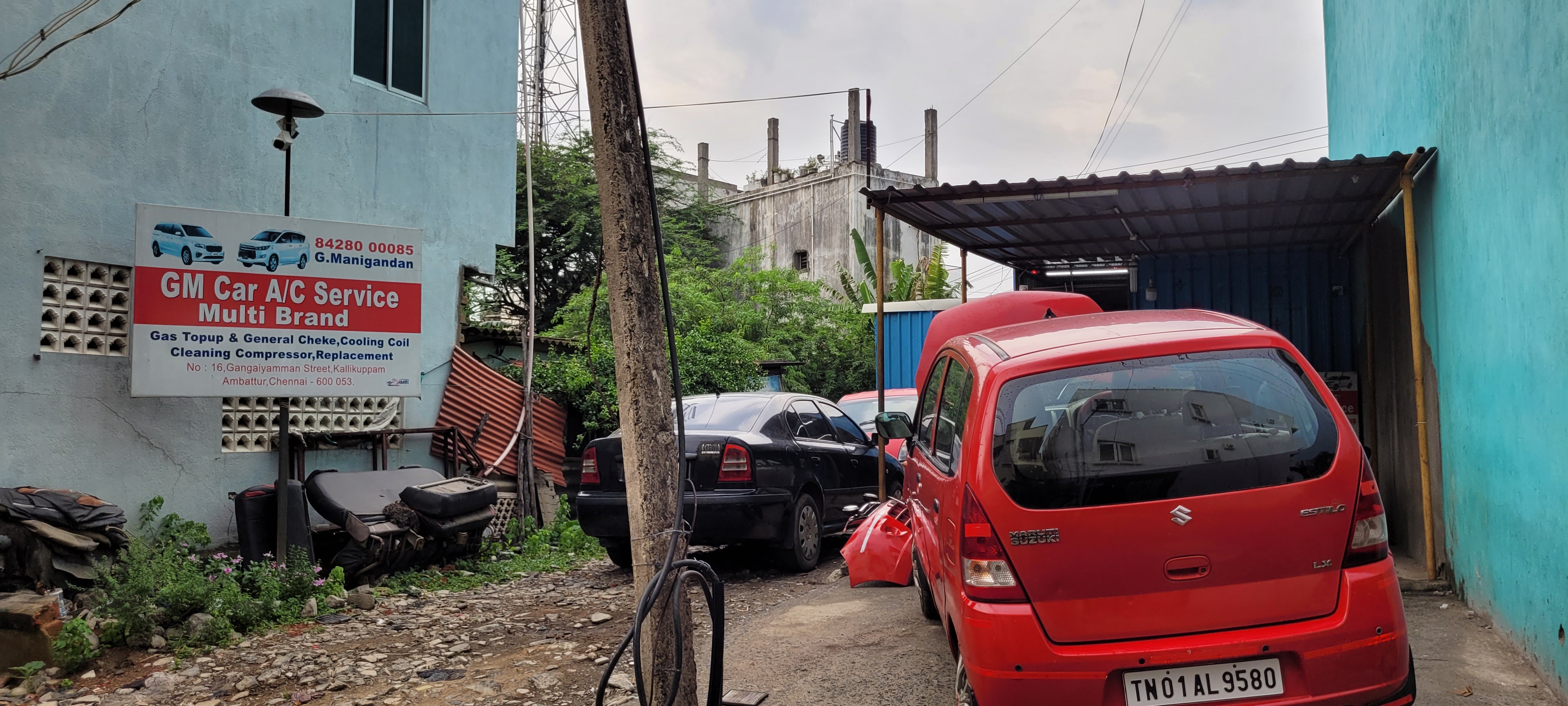 Car AC repair in progress at GM Car AC Service Ambattur